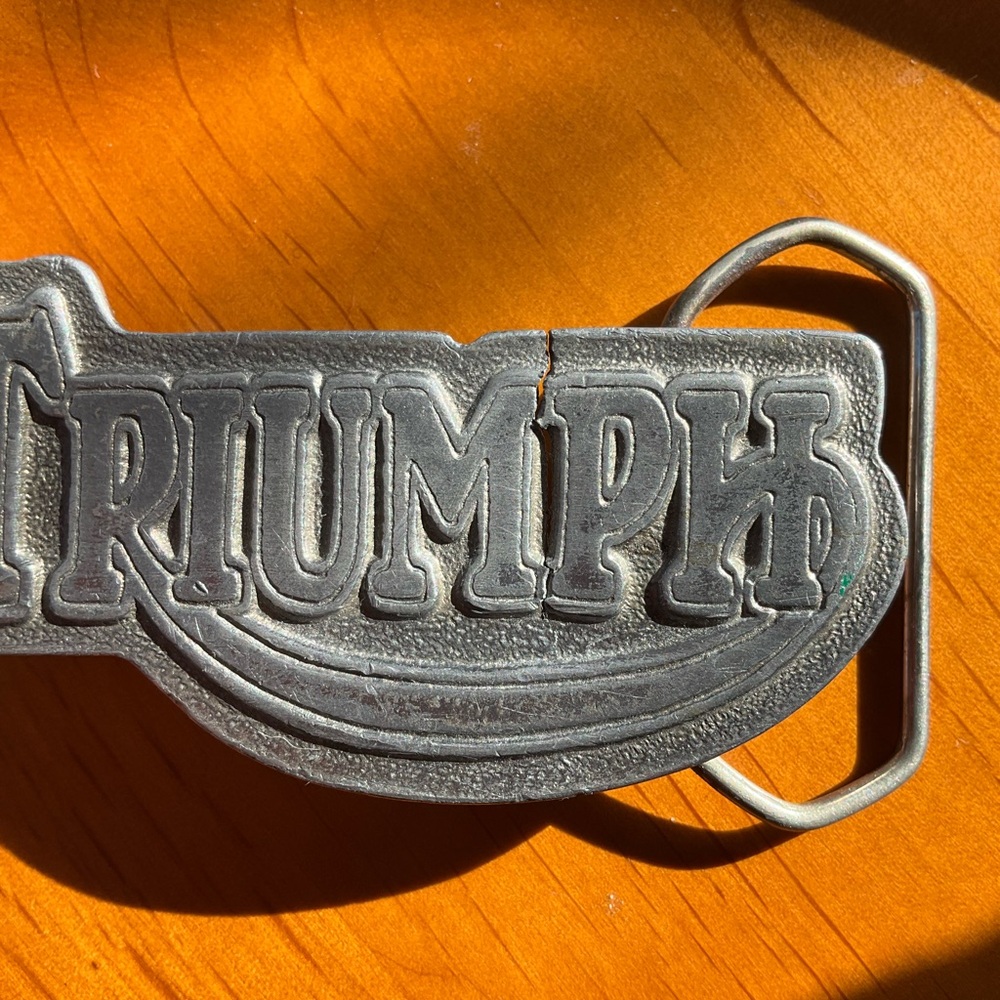 Triumph Gray Belt Buckle